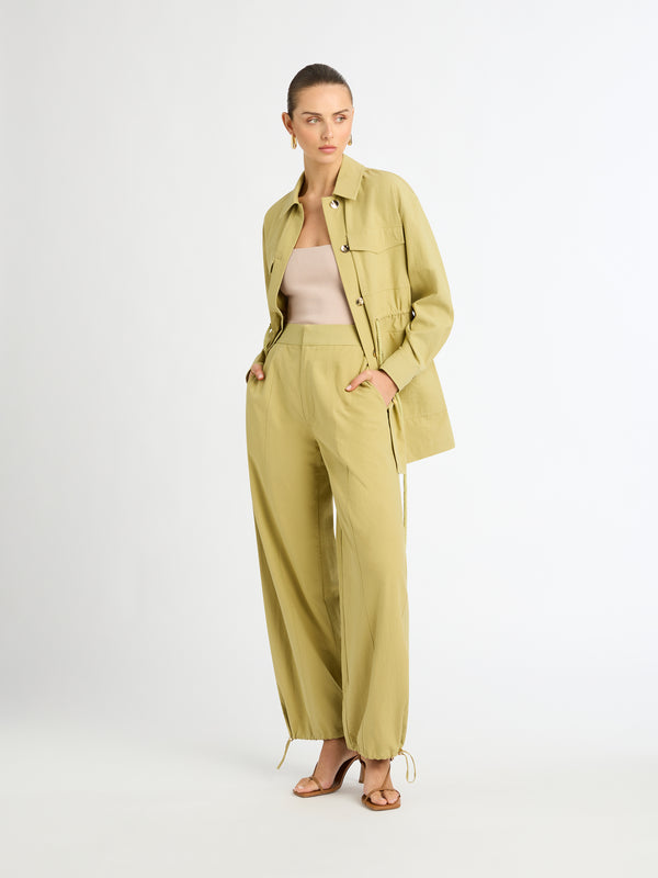 HAYES PANT IN MOSS GREEN STYLED IMAGE