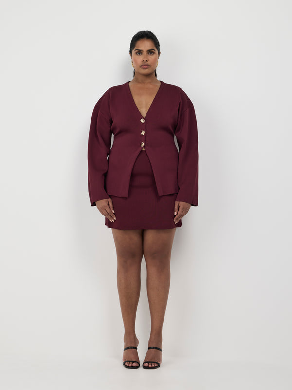 Size16 SHEIKE Bailey Knit Mini Skirt Burgundy 1007492 Front Image