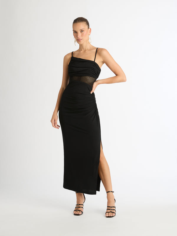 AMALIA MAXI DRESS IN BLACK WITH MESH CUTOUT FRONT HSOT ON MODEL ARIARNE
