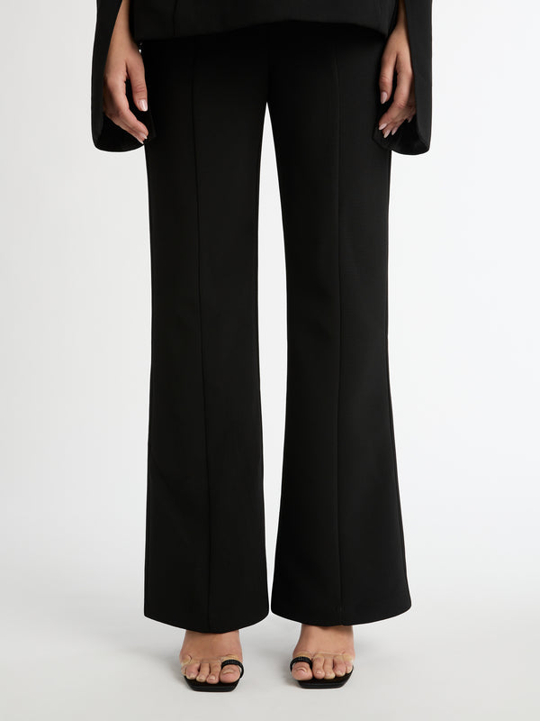 FRANKIE HIGH WAISTED FLARE PANT IN BLACK CLOSE UP