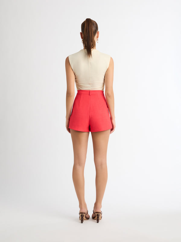 KISS AND TELL SHORTS IN RED BACK SHOT