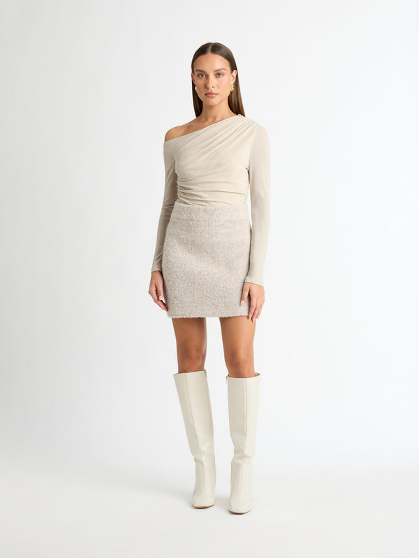 ALAIA KNIT MINI SKIRT OAT FRONT IMAGE STYLED