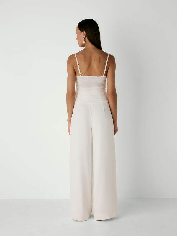 TAI CAMI, back view