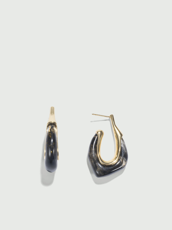 TARA EARRING, flat lay
